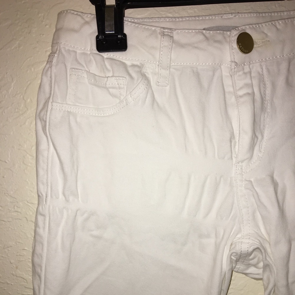 Mid rise white skinny jeans